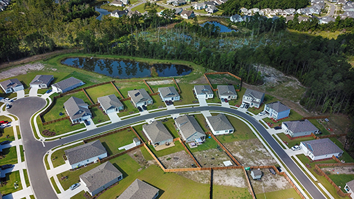 Aerial photo of new housing development under construction by Full Send Aerial